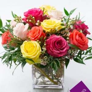 Assorted color roses in vase