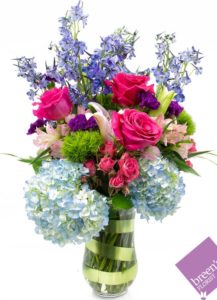 red roses and purple flowers and blue hydrangeas